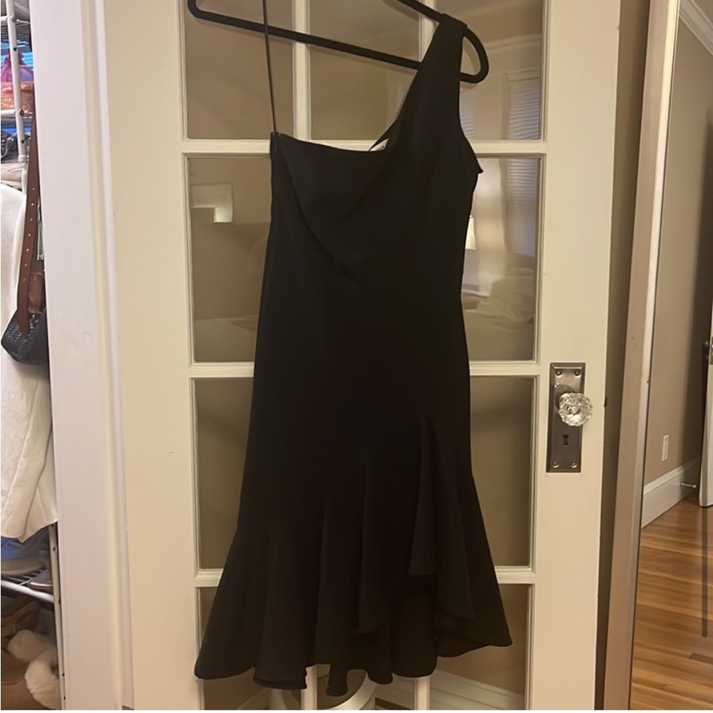 Likely Black One Shoulder Asymmetrical
Ruffle Hem Mermaid Trumpet Midi
Cocktail - Picture 4 of 6